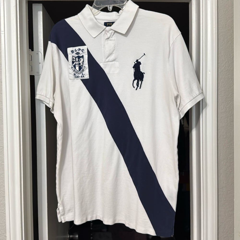 EUC Ralph Lauren shirt. Has the iconic pony on left side and patch on left side